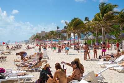 mexico cancun group young people relaxing playing sunbathing beach grand pyramid entertaining complex february 152615918